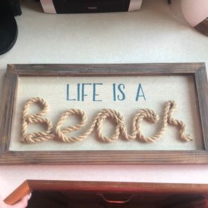 “Life is a Beach” sign